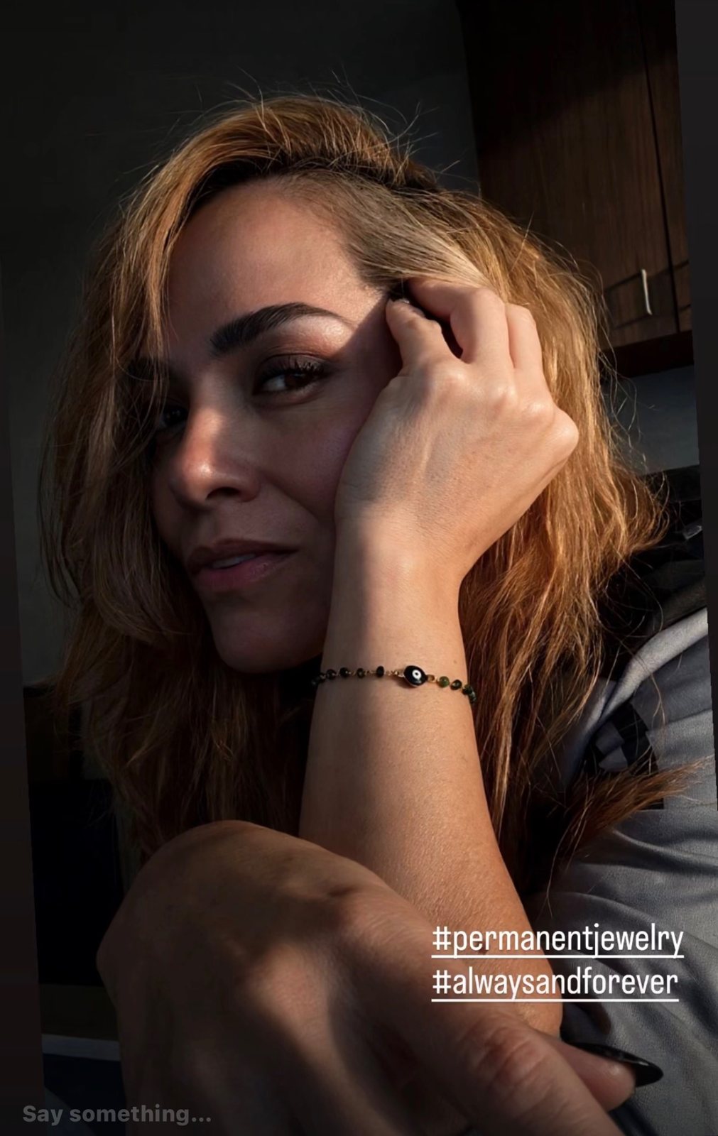 Model wearing an evil eye bracelet