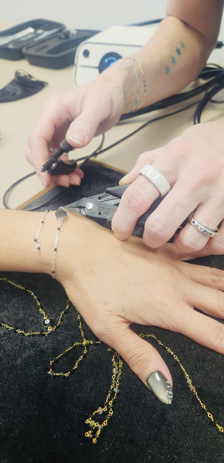 Custom bracelet being fitted