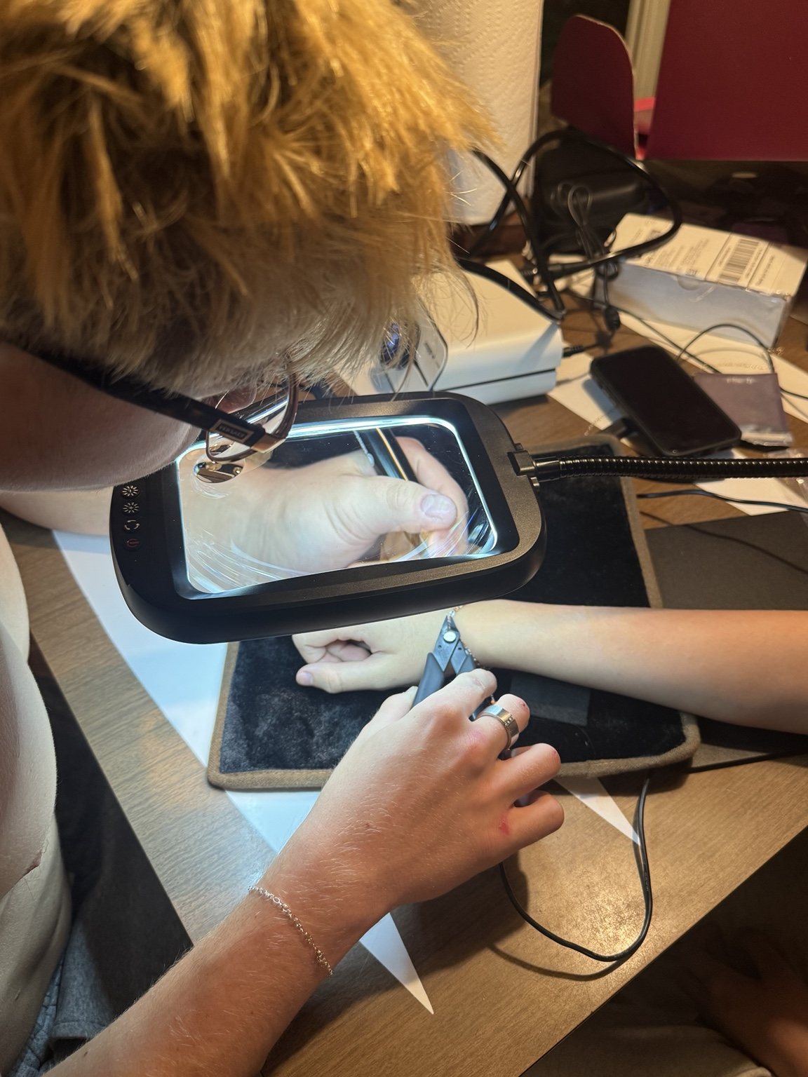 Permanent jewelry being welded